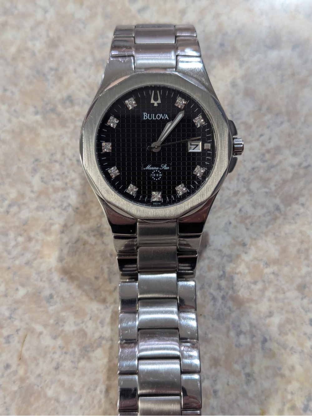Bulova Marine Star 96D14 stainless steel quartz watch with black diamond markers